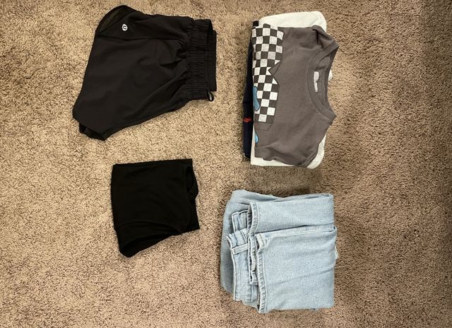 Jeans and brown shirt folded